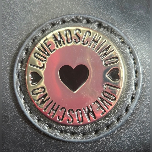 LOVE MOSCHINO QUILTED GOLD CHAIN BACKPACK.